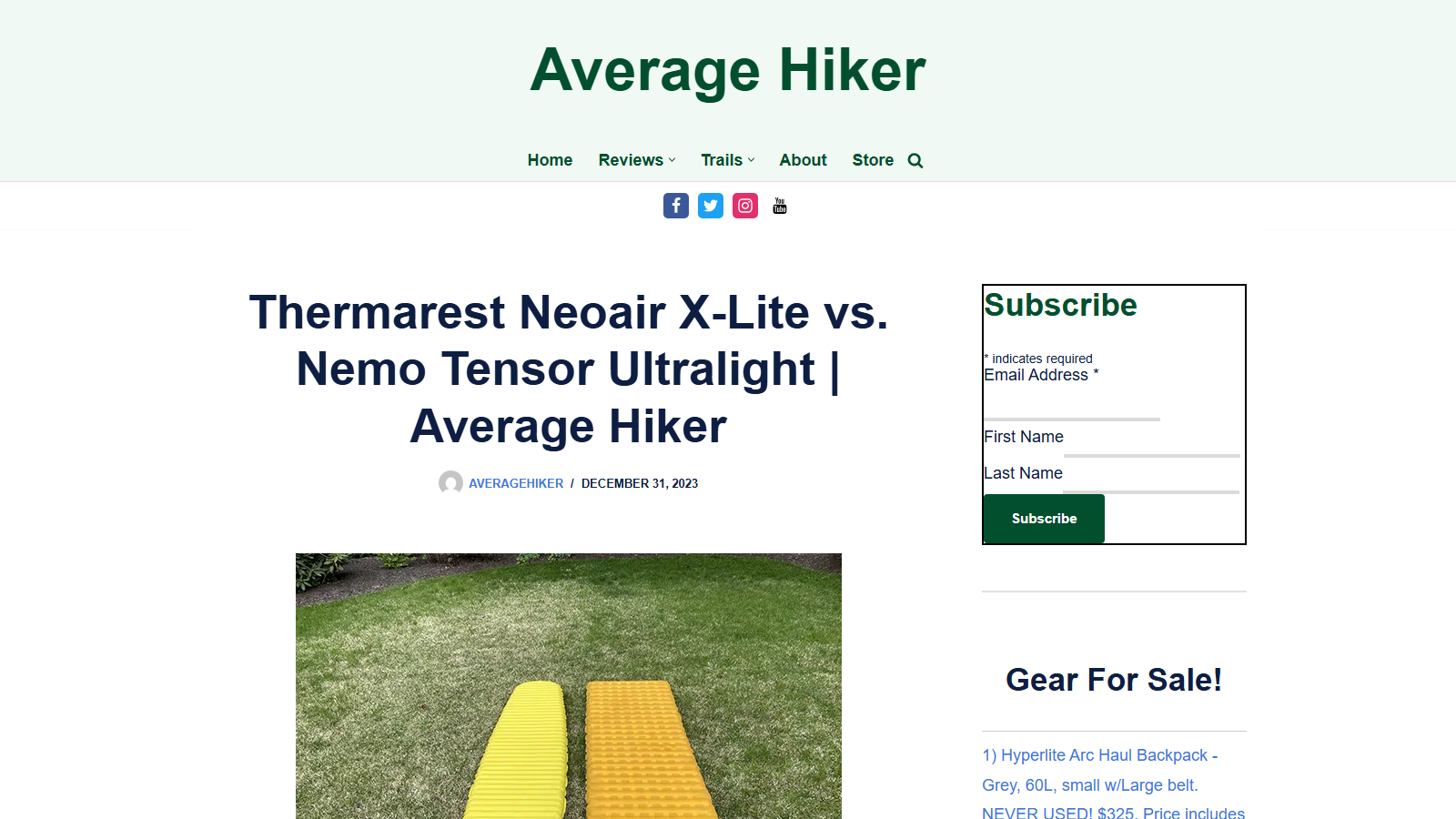 Average Hiker blog post titled 'Thermarest Neoair X-Lite vs. Nemo Tensor Ultralight', dated December 31, 2023, with a photo of a bright yellow and an orange-yellow inflatable sleeping pad laid side by side on a lawn; a subscribe form and a 'Gear For Sale!' list sit in the right sidebar.