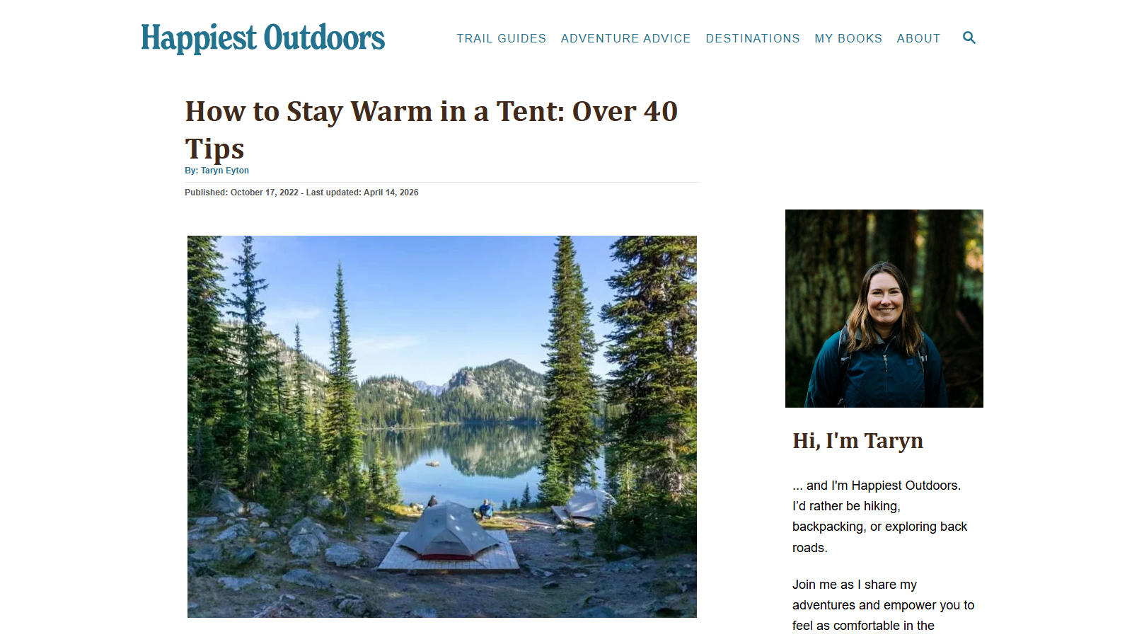 Headline "How to Stay Warm in a Tent: Over 40 Tips" by Taryn Eyton above a photo of a grey backpacking tent on a wooden platform beside a still alpine lake ringed by fir trees and mountains, with the author's portrait in the sidebar